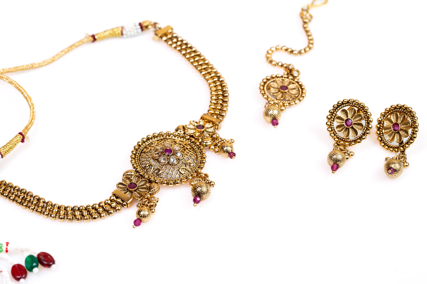 Traditional Gold  Plated Floral Jewellery Set: Ornate Floral Necklace, Earrings, and Maangtika with Ruby Accent -Artificial Jewelry For Women And Girls - Buy Online at The Laxmi Company