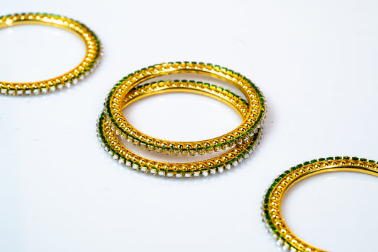 Traditional Indian-Inspired Radiant Golden Bangles Set with Sparkling Rhinestone Embellishments-Exquisite Artificial Jewelry for Women featuring Emerald and Pearl Accents- Buy Online at The Laxmi Collection