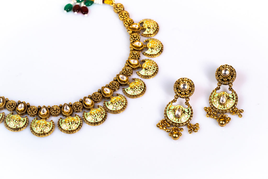 Regal Antique Kundan-Style Choker with Matching Earrings Set: Luxurious Gold-Toned Artificial Jewelry for Women -Buy Online at The Laxmi Collection