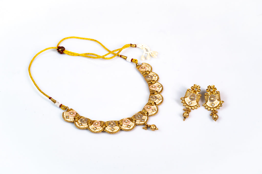 Enchanting Floral Coin Choker with Ornate Petal Earrings Set: Elegant Gold-Toned Artificial Jewelry for Women - The Laxmi Collection