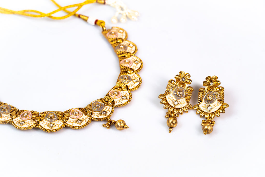 Enchanting Floral Coin Choker with Ornate Petal Earrings Set: Elegant Gold-Toned Artificial Jewelry for Women - The Laxmi Collection