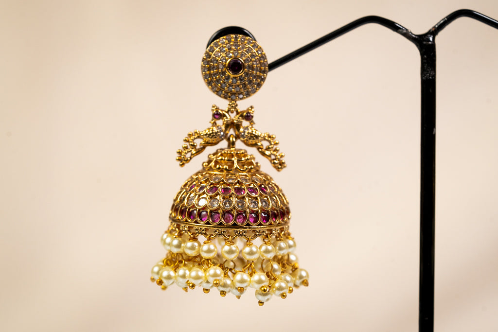 Gold Jhumka Earrings with Pearl Cluster and Ruby Accents