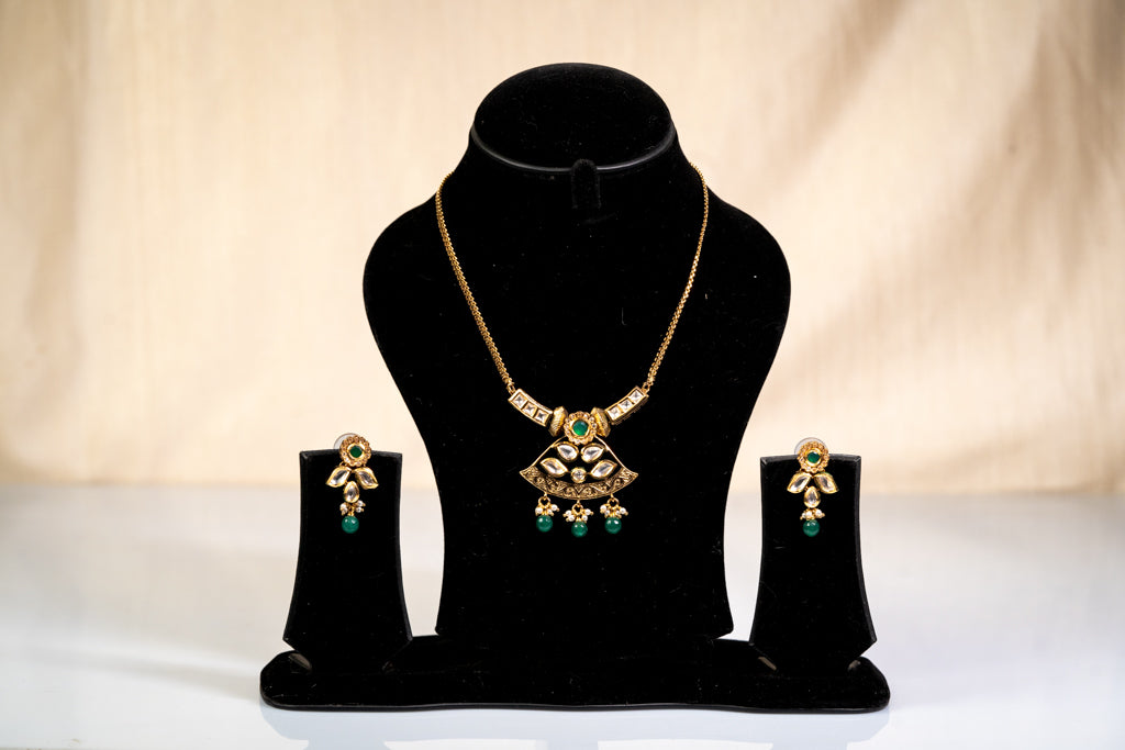 Elegant Gold-Toned Green Gemstone Kundan Necklace Set: Temple Design Antique Artificial Jewelry for Women - The Laxmi Collection