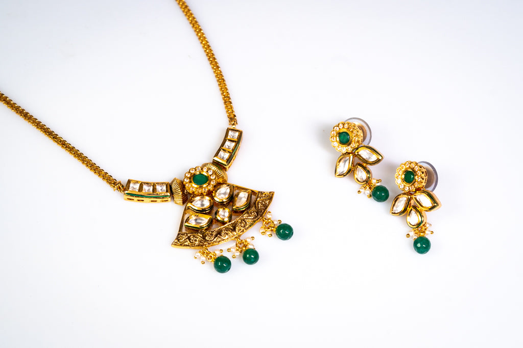 Elegant Gold-Toned Green Gemstone Kundan Necklace Set: Temple Design Antique Artificial Jewelry for Women - The Laxmi Collection