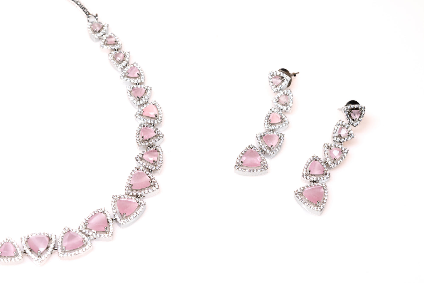 Enchanting Pink Crystal Necklace Set: Glamorous Silver-Toned Triangle Gem Collection - Dazzling Artificial Jewellery for Women's Evening Elegance Buy Online - The Laxmi Company